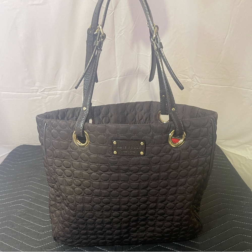 Kate Spade Quilted dark leather tote with signature lining